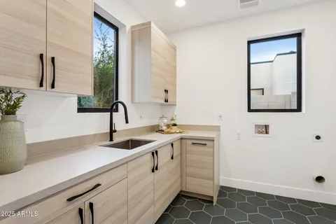 a view of a sink and a mirror