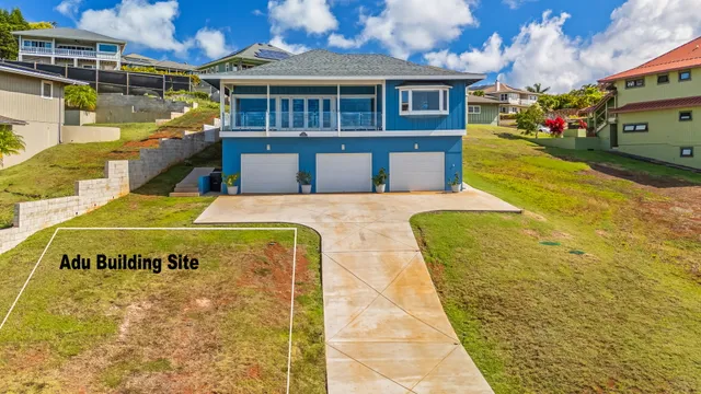 a front view of house with outdoor space