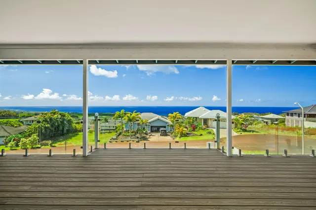 a view of a balcony with an outdoor space