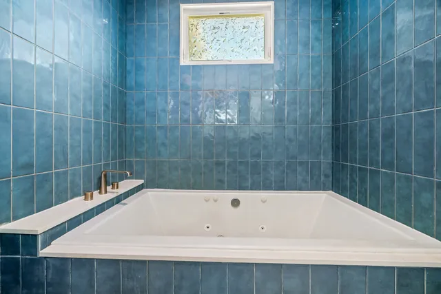 a bathroom with a bathtub