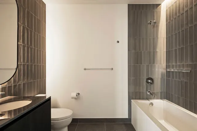 a bathroom with a sink and toilet