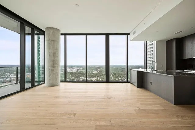 a view of workspace with large windows