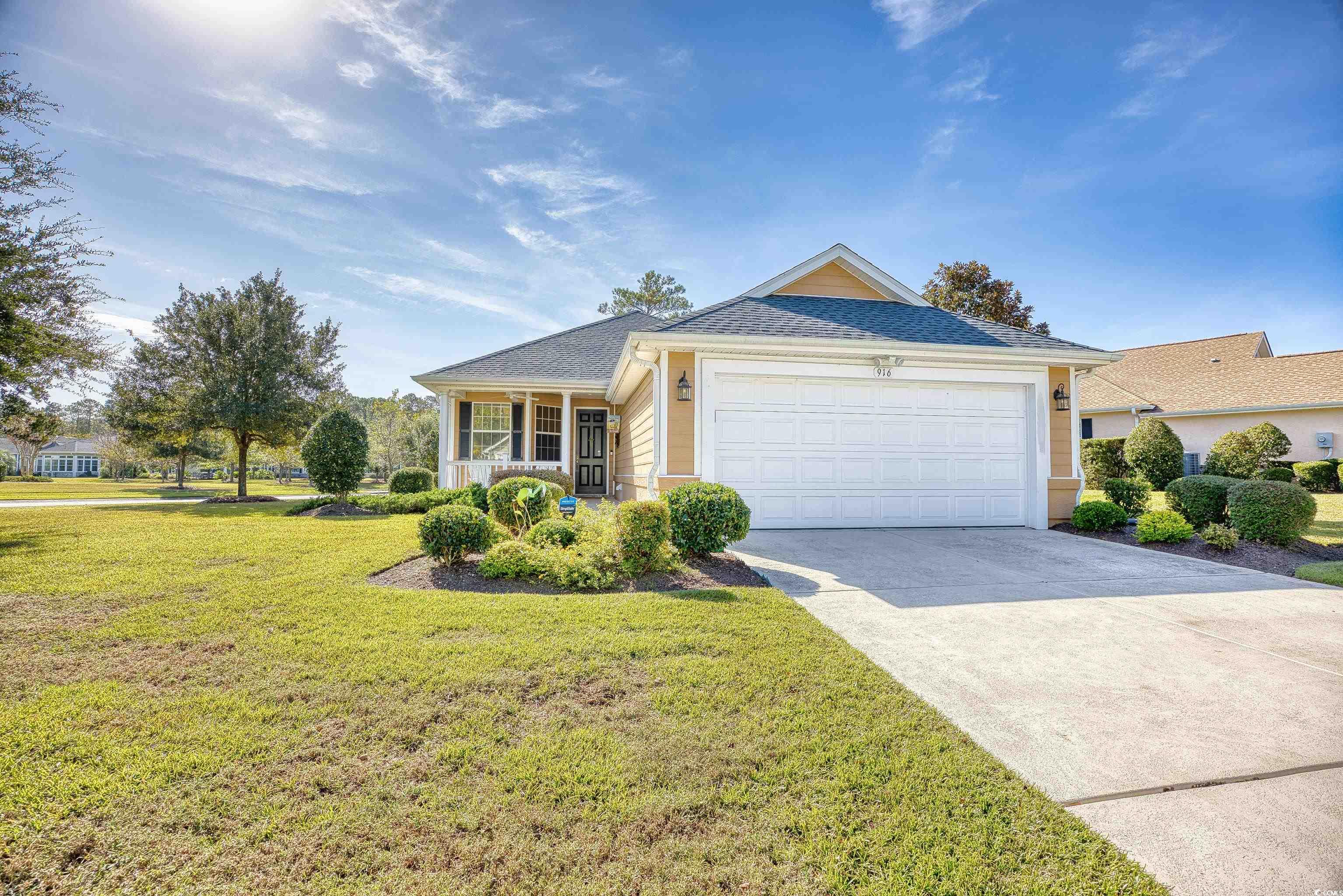 916 Laquinta Loop Murrells Inlet, SC 29576 - Photo 3 of 40 Painted driveway, walkway, and porches (front and