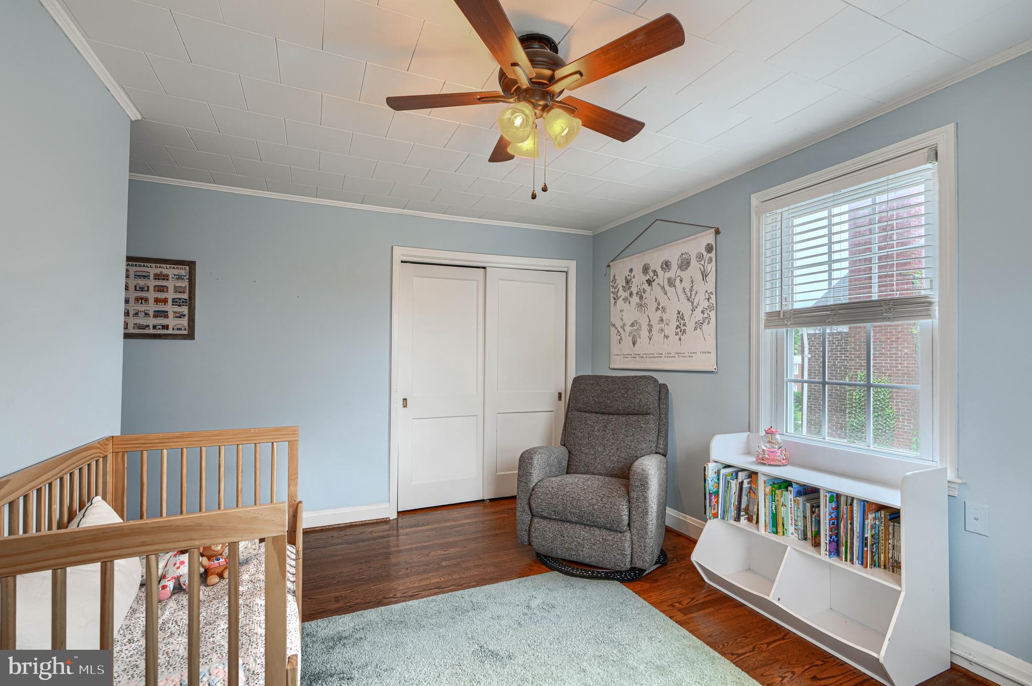 8132 Pleasant Plains Road Towson, MD 21286 - Photo 28 of 55 a living room with furniture stairs and a window