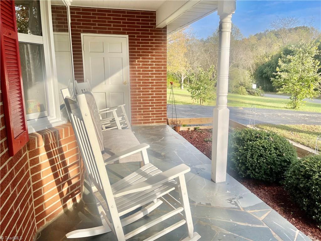 1079 Suncrest Orchard Road North Wilkesboro, NC 28659 - Photo 30 of 30 Front porch