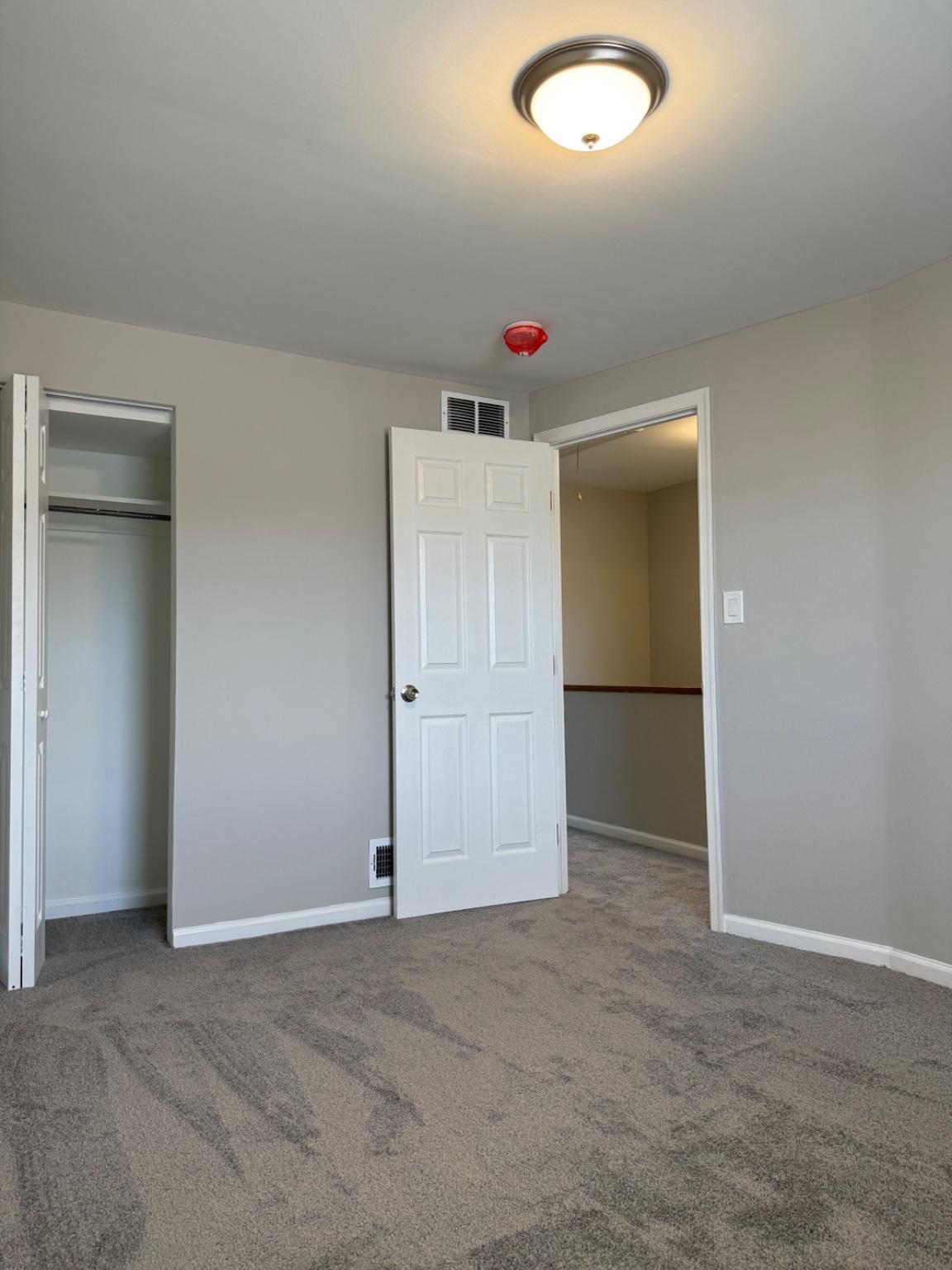 2908 Mallview Road Baltimore, MD 21230 - Photo 16 of 22 an empty room with closet and cabinet