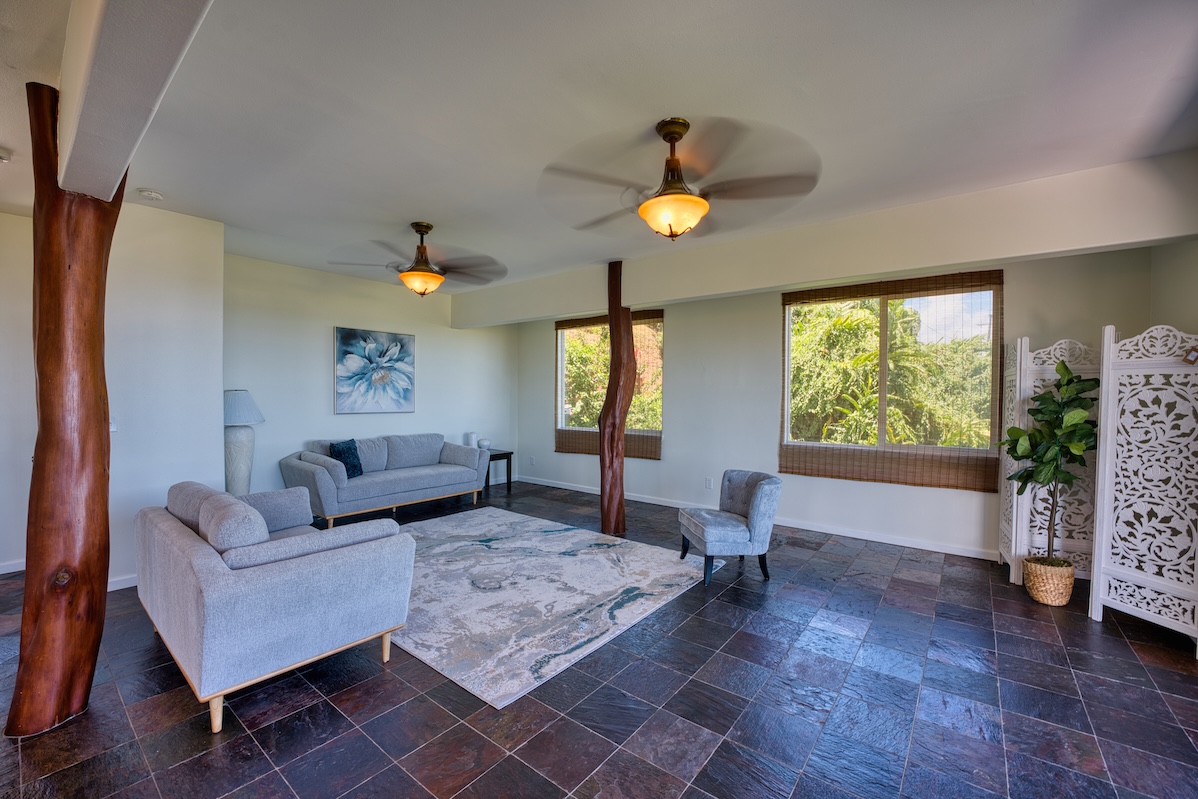 149 Halai Street Hilo, HI 96720 - Photo 14 of 26 a living room with furniture and a large window