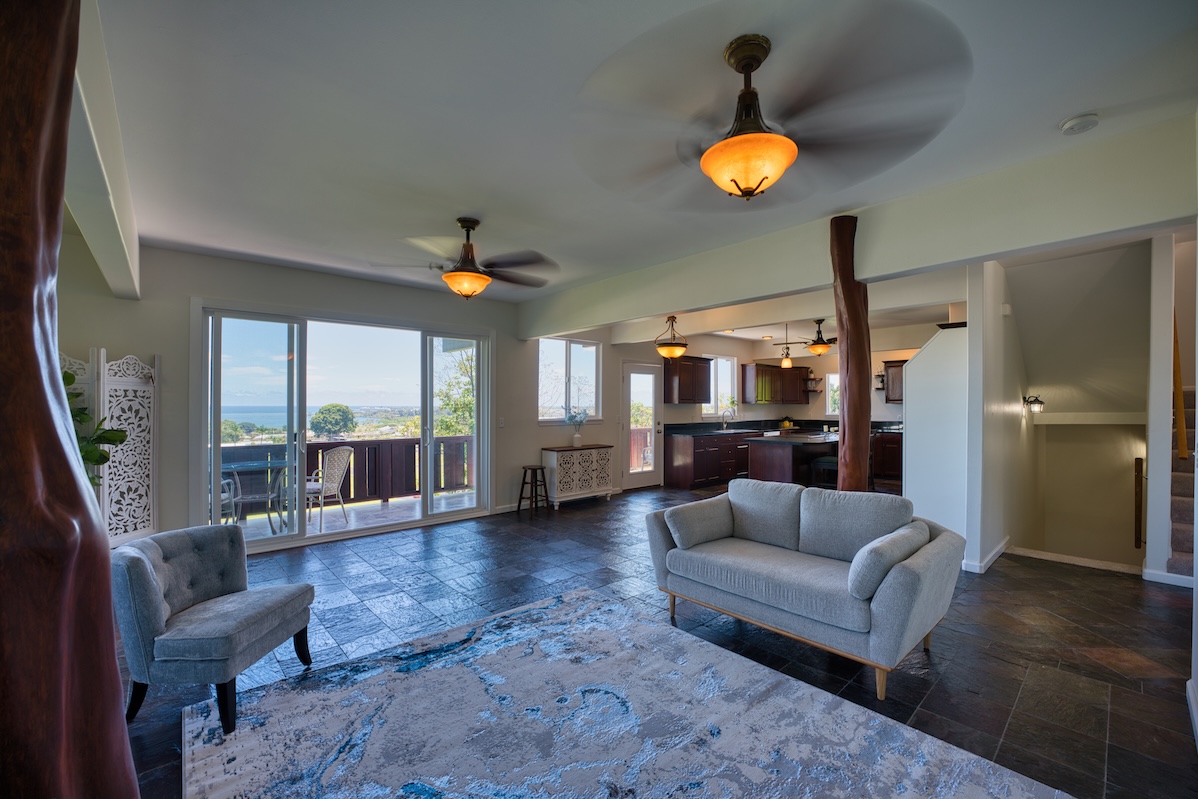 149 Halai Street Hilo, HI 96720 - Photo 15 of 26 a living room with furniture and a chandelier