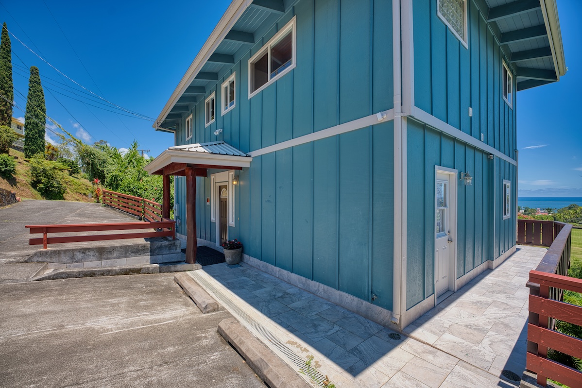 149 Halai Street Hilo, HI 96720 - Photo 7 of 26 a backyard of a house with barbeque oven table and chairs