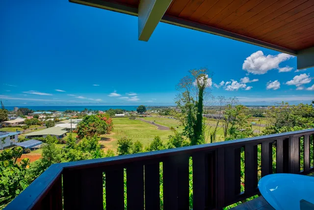 a view of a balcony with an outdoor space