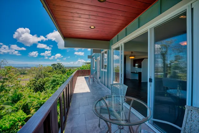 a dining room with furniture and outdoor view