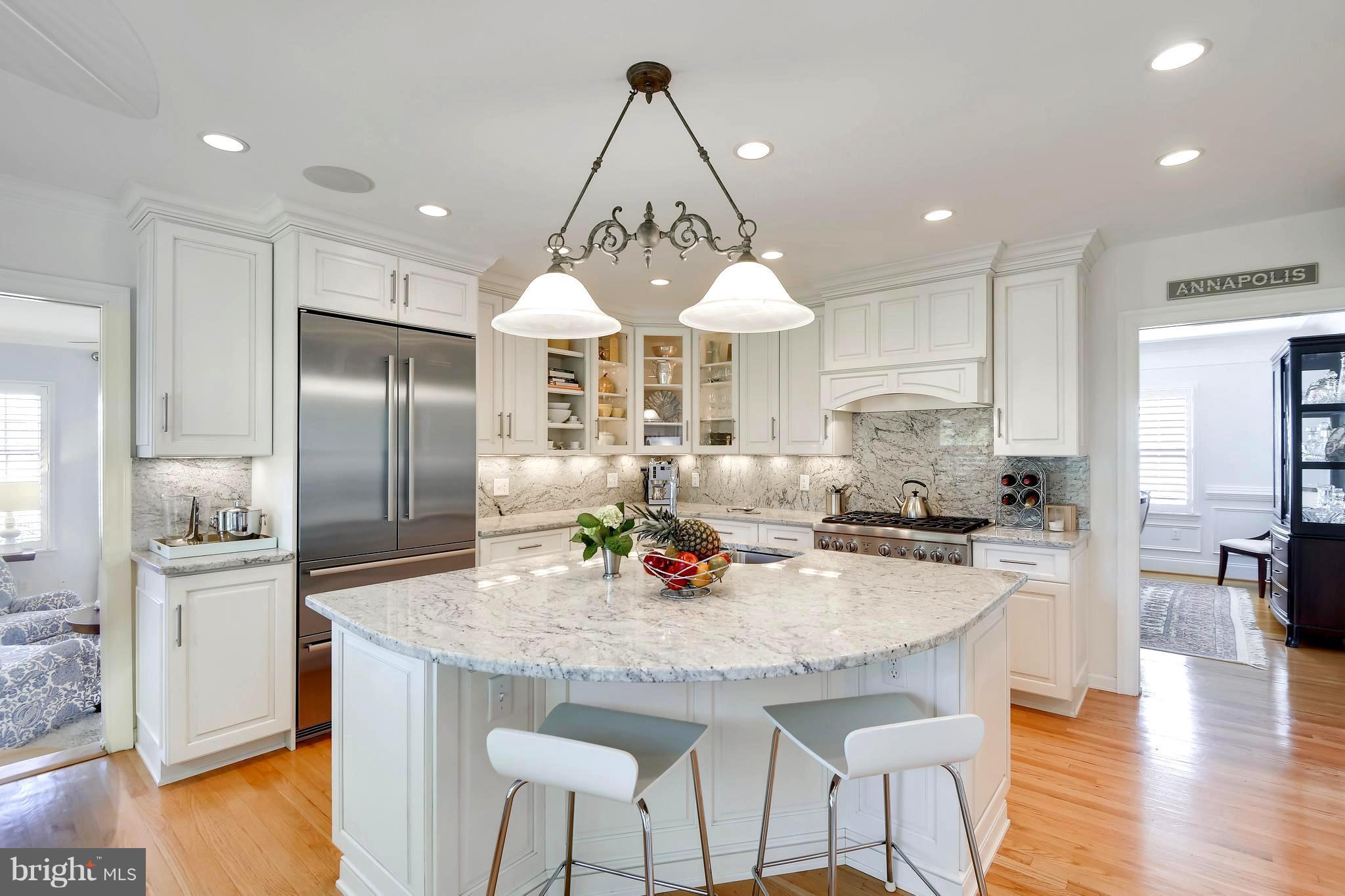 1190 South River Landing Road Edgewater, MD 21037 - Photo 14 of 30 a kitchen with stainless steel appliances granite countertop a stove refrigerator and cabinets