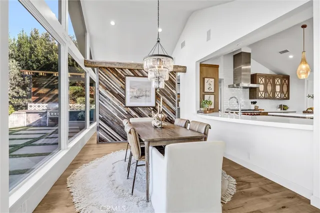 a view of a living room and dining room