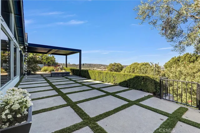 a view of balcony with furniture