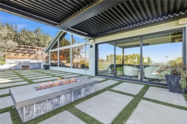 a view of a backyard of a house
