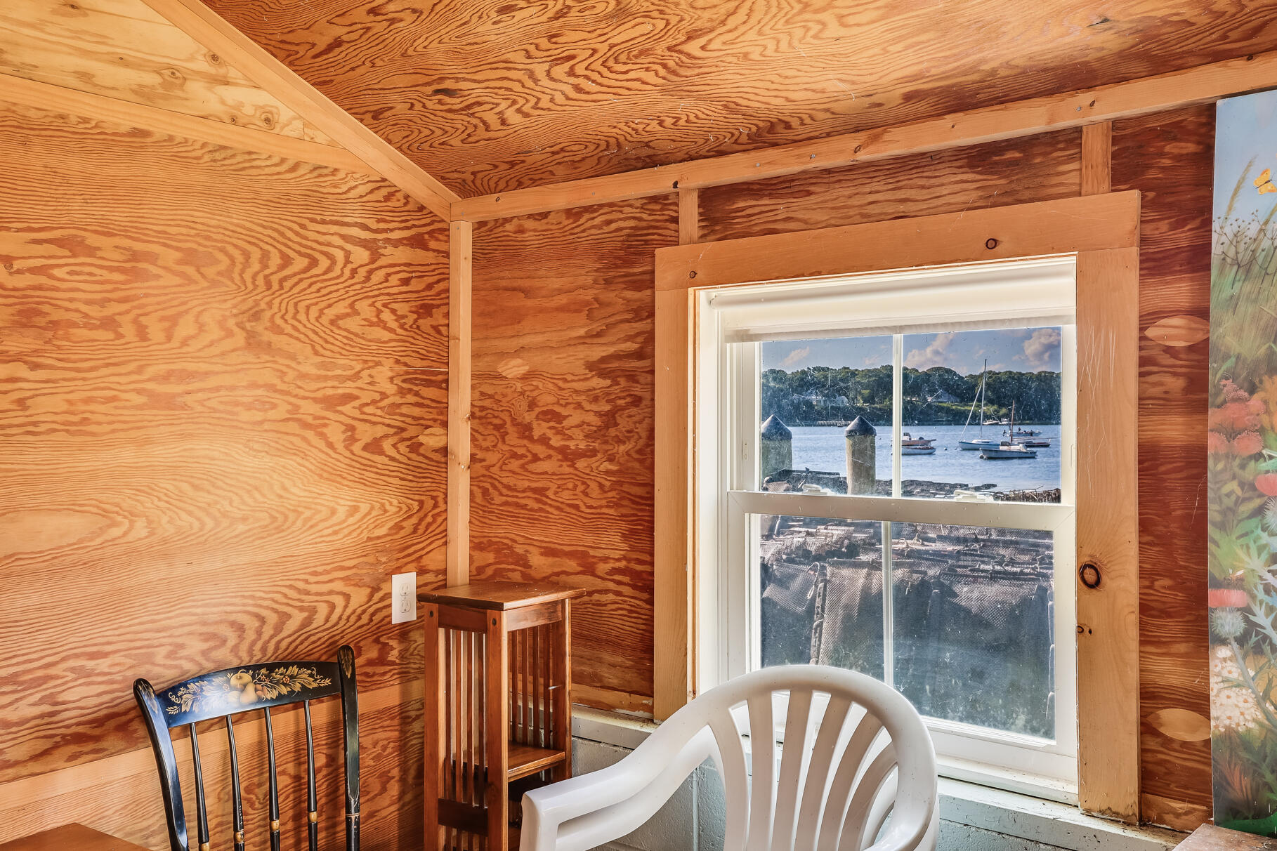 28 Little River Road Cotuit, MA 02635 - Photo 12 of 17 a view of a balcony with wooden floor