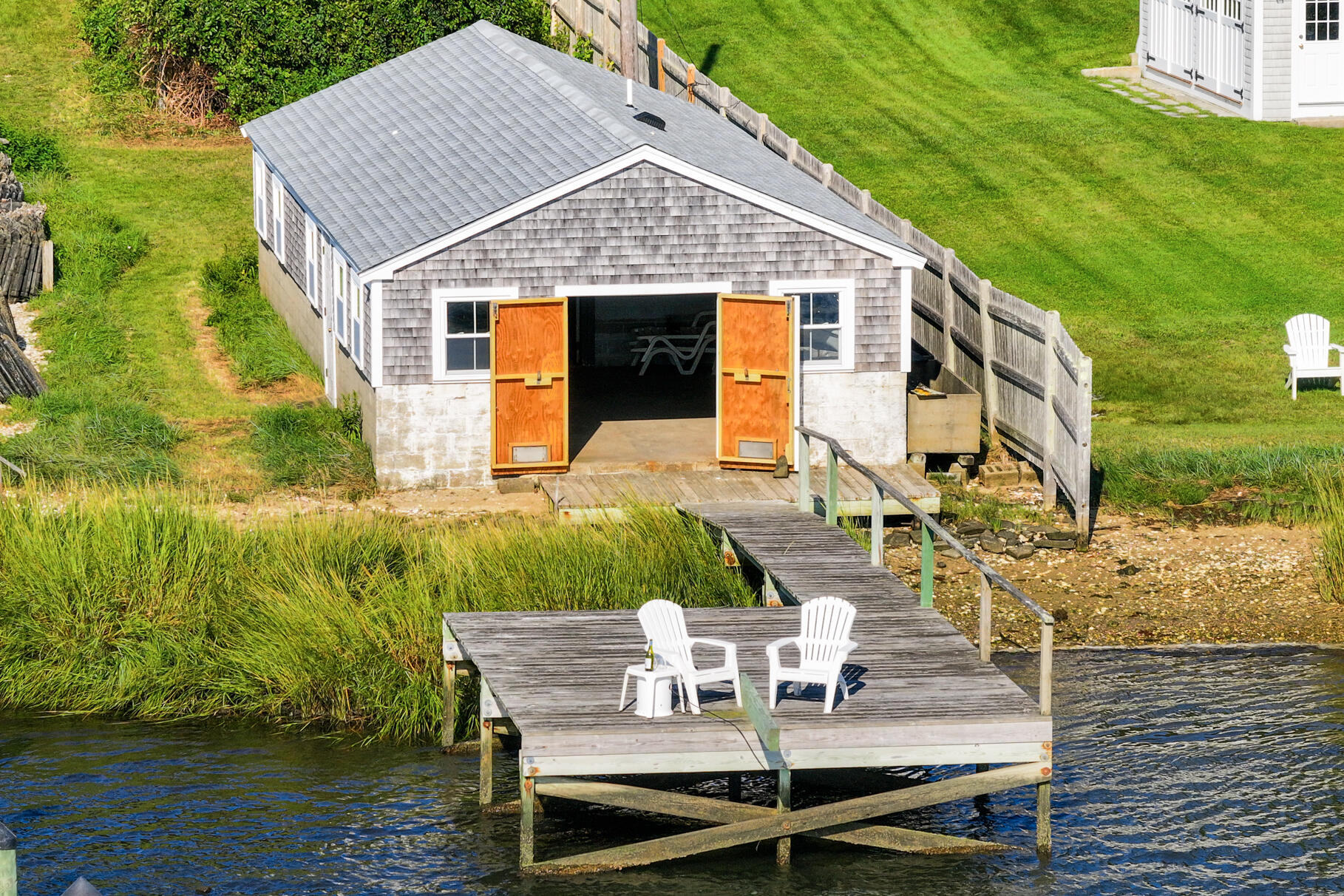 28 Little River Road Cotuit, MA 02635 - Photo 15 of 17 a view of house with backyard and sitting area