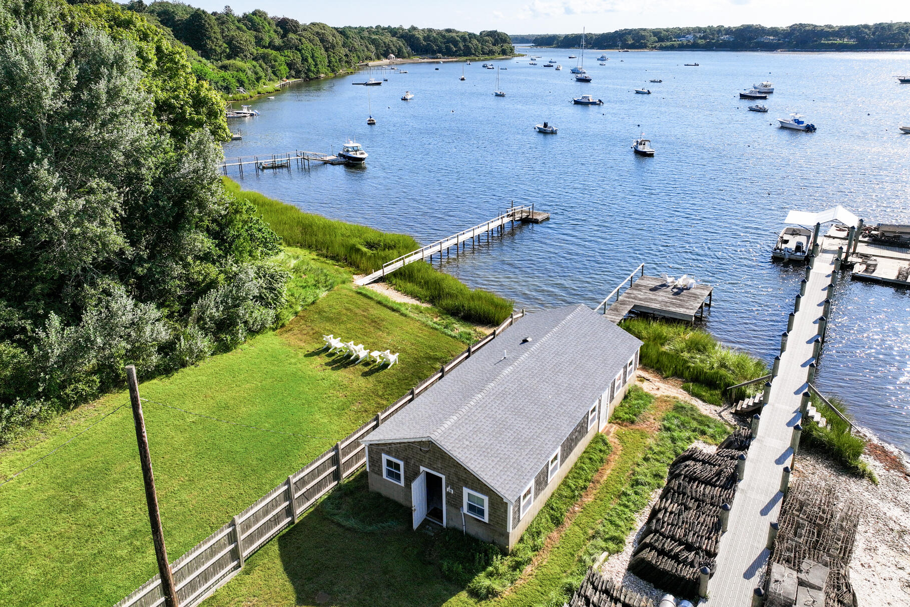 28 Little River Road Cotuit, MA 02635 - Photo 3 of 17 an aerial view of a house