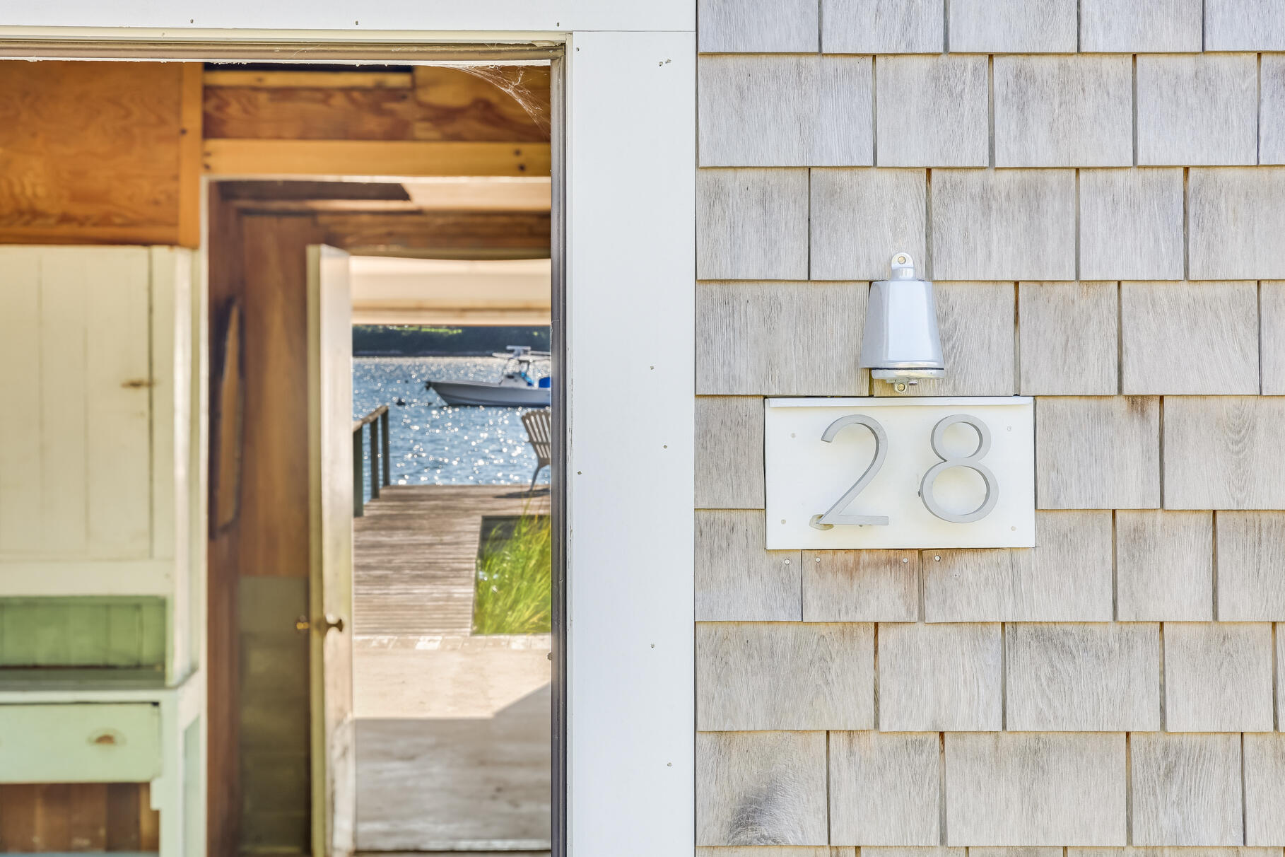 28 Little River Road Cotuit, MA 02635 - Photo 9 of 17 a view of a wooden door