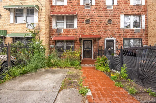 a picture of a bench in front of a wall