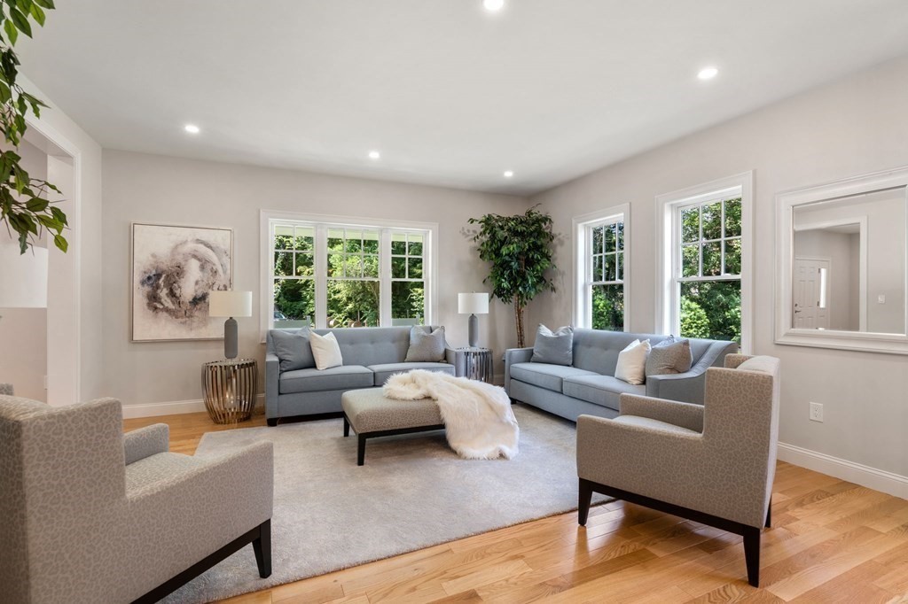 3 Emmeline Path, Unit 3 Wayland, MA 01778 - Photo 3 of 22 a living room with furniture and a large window