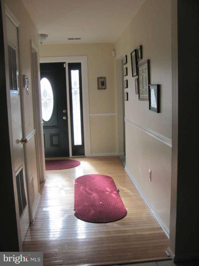 11809 Cherry Tree Crossing Road Brandywine, MD 20613 - Photo 14 of 30 Hall from Kitchen to Front Door