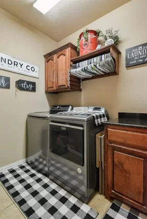 a stove top oven sitting inside of a kitchen