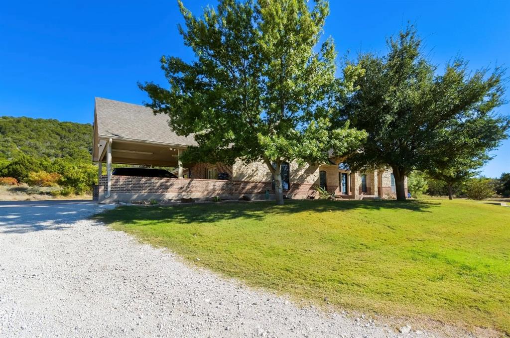 2457 Highway 83 Tuscola, TX 79562 - Photo 3 of 40 a front view of a house with a yard