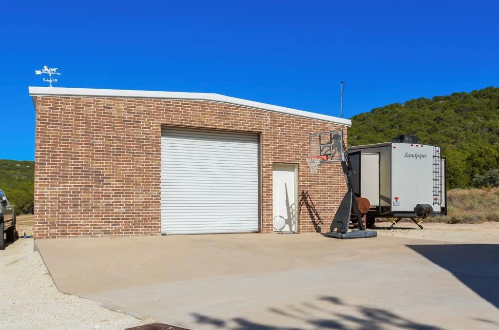 2457 Highway 83 Tuscola, TX 79562 - Photo 39 of 40 a view of a house with a backyard