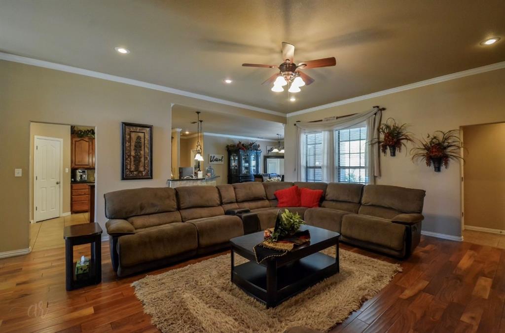 2457 Highway 83 Tuscola, TX 79562 - Photo 9 of 40 a living room with furniture and wooden floor