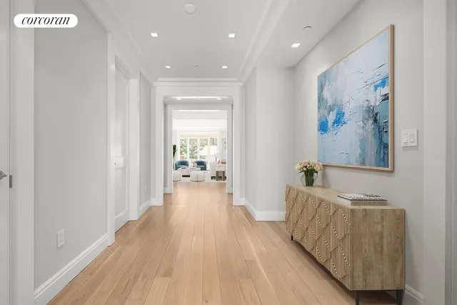 a room with furniture and wooden floor