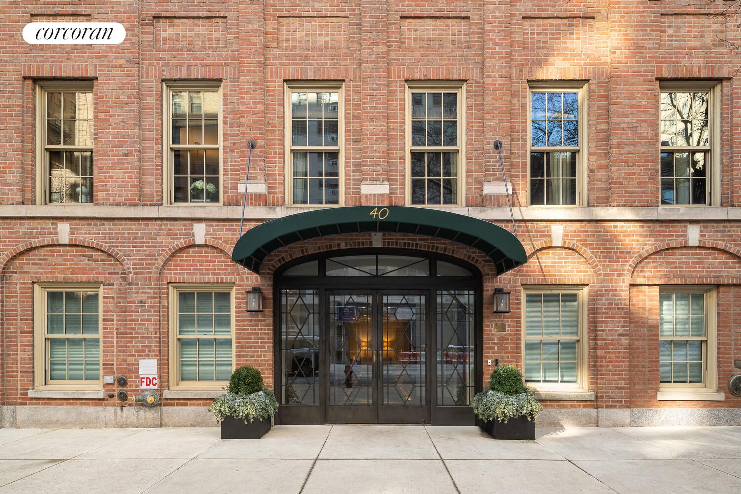 40 East 72nd Street, Unit MAIS Manhattan, NY 10021 - Photo 15 of 16 a front view of multiple houses