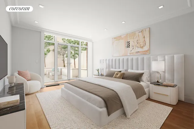 a bedroom with a large bed and a large window