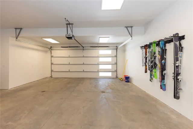 a view of a garage with stairs