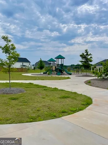 a view of a golf course with a lake
