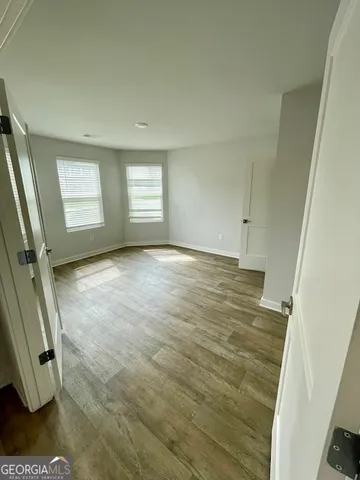 an empty room with windows