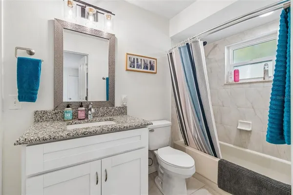 a view of a house with a big yard