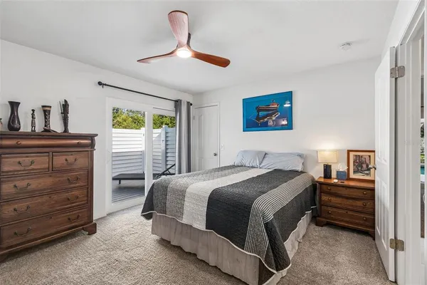 a view of a backyard with a bench