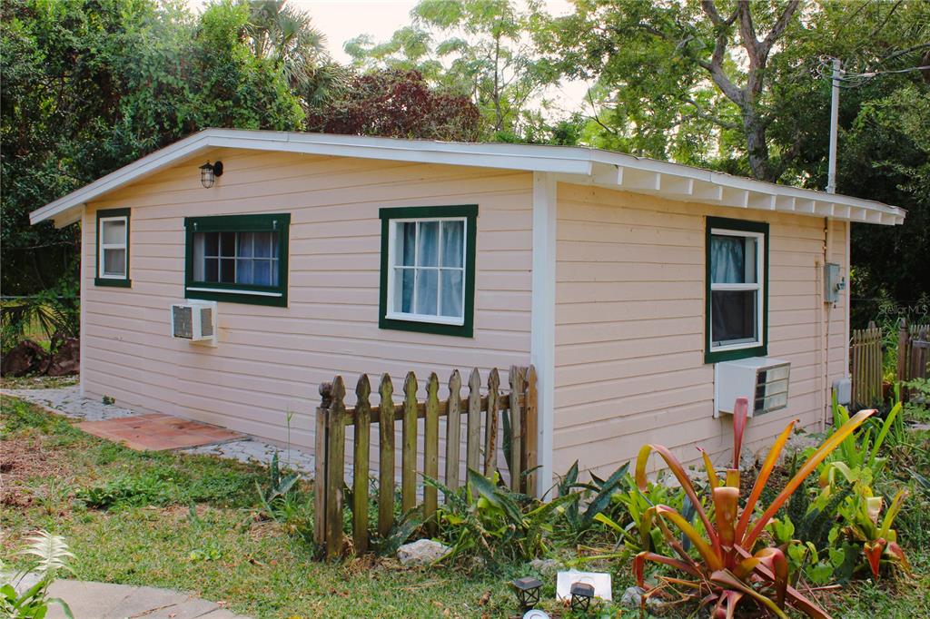 4225 Bradenton Road, Unit C Sarasota, FL 34234 - Photo 13 of 19 a front view of a house with garden