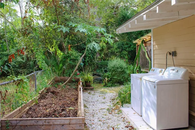 a backyard of a house with lots of green space