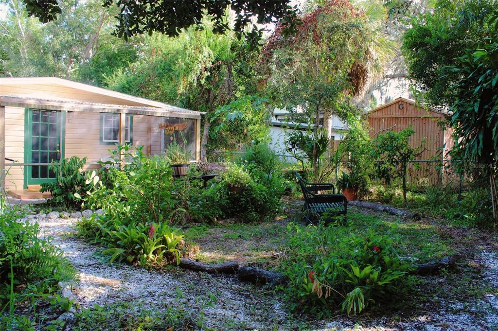 4225 Bradenton Road, Unit C Sarasota, FL 34234 - Photo 15 of 19 a view of a house with a backyard