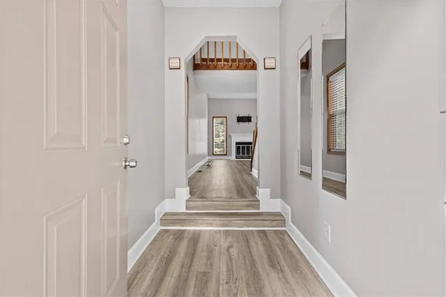 a view of a hallway view with staircase