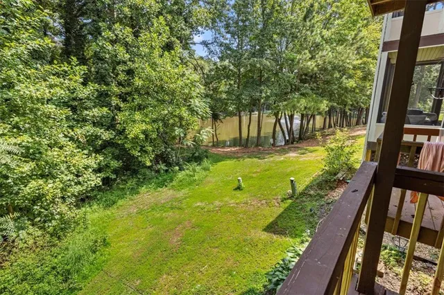 a view of yard with swimming pool