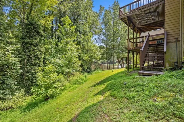 a view of a house with a tree