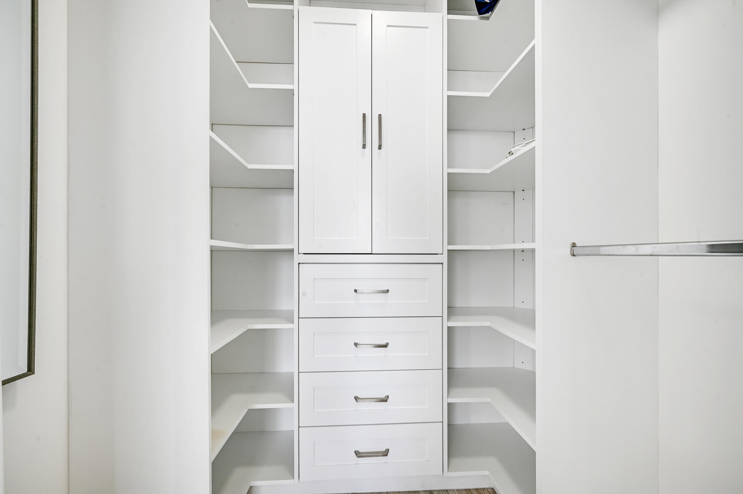 1300 Florida A1A, Unit 624 Jupiter, FL 33477 - Photo 18 of 35 a view of an empty walk in closet