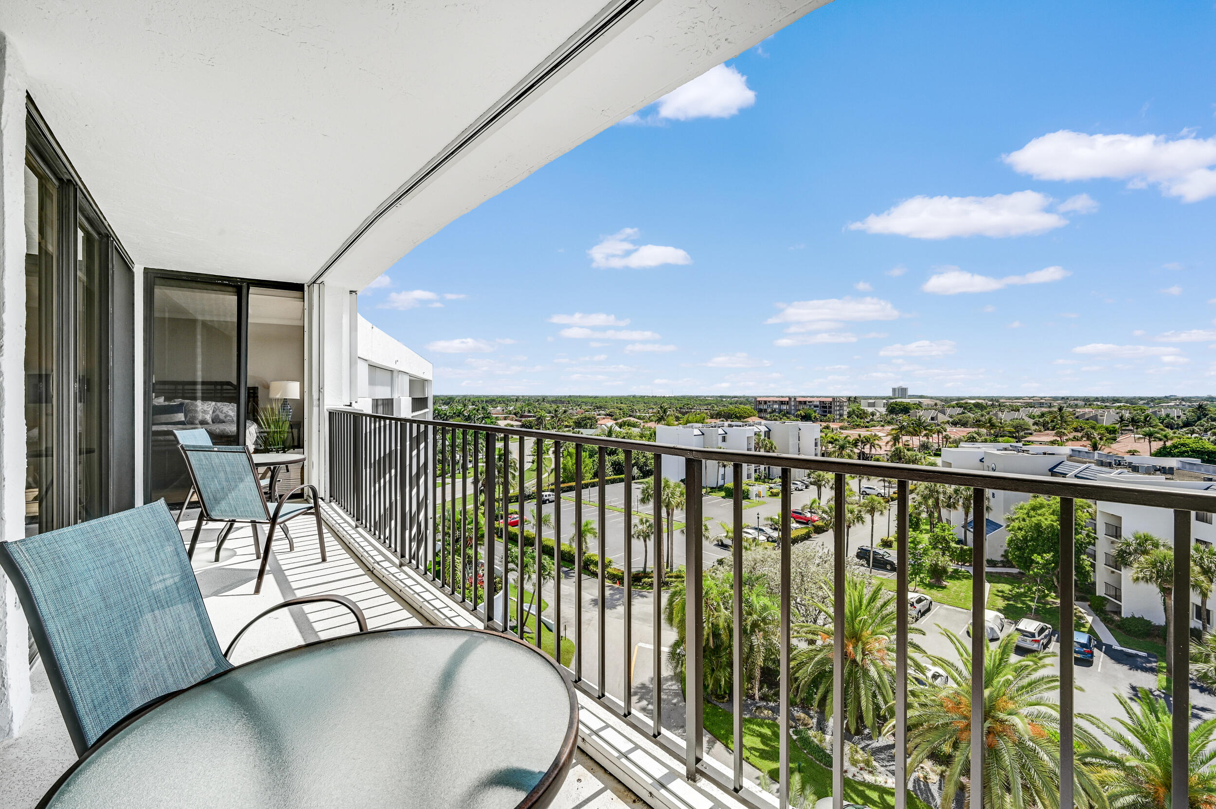 1300 Florida A1A, Unit 624 Jupiter, FL 33477 - Photo 21 of 35 a view of a chairs and table in a balcony