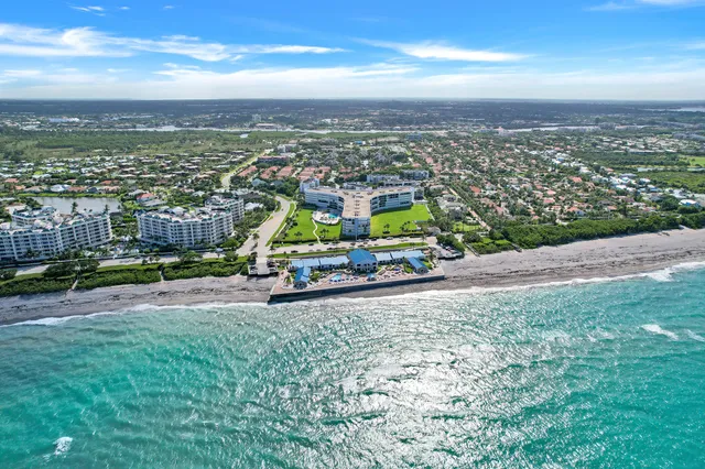 an aerial view of a city with lots of residential buildings