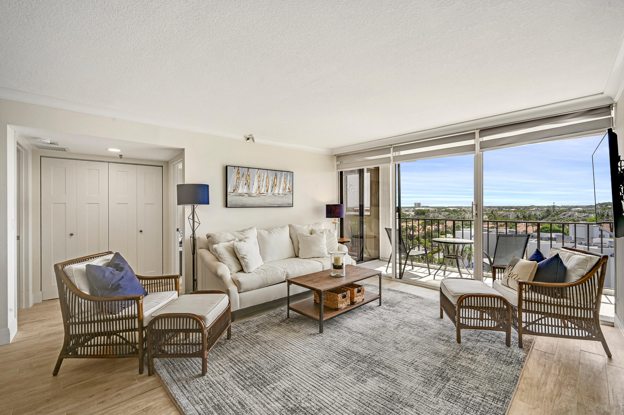 1300 Florida A1A, Unit 624 Jupiter, FL 33477 - Photo 3 of 35 a living room with furniture and a floor to ceiling window