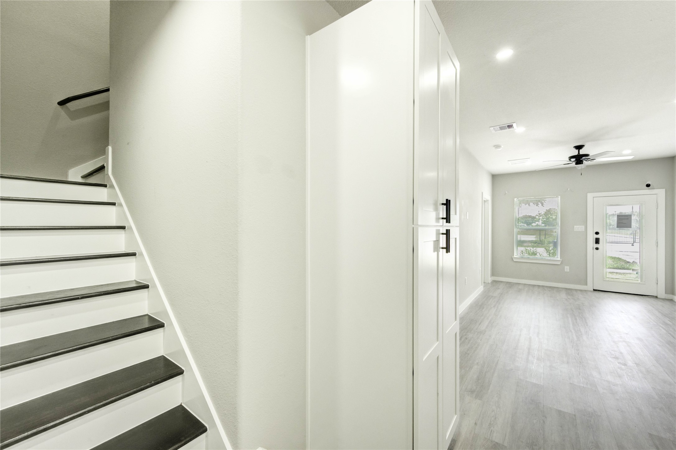 8157 Tate Street, Unit A Houston, TX 77028 - Photo 14 of 29 a view of a hallway with wooden floor and entryway