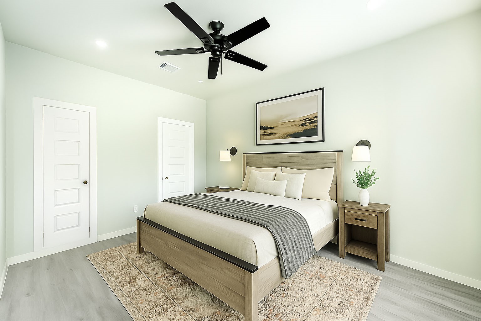 8157 Tate Street, Unit A Houston, TX 77028 - Photo 18 of 29 a bedroom with a bed and a painting on the wall